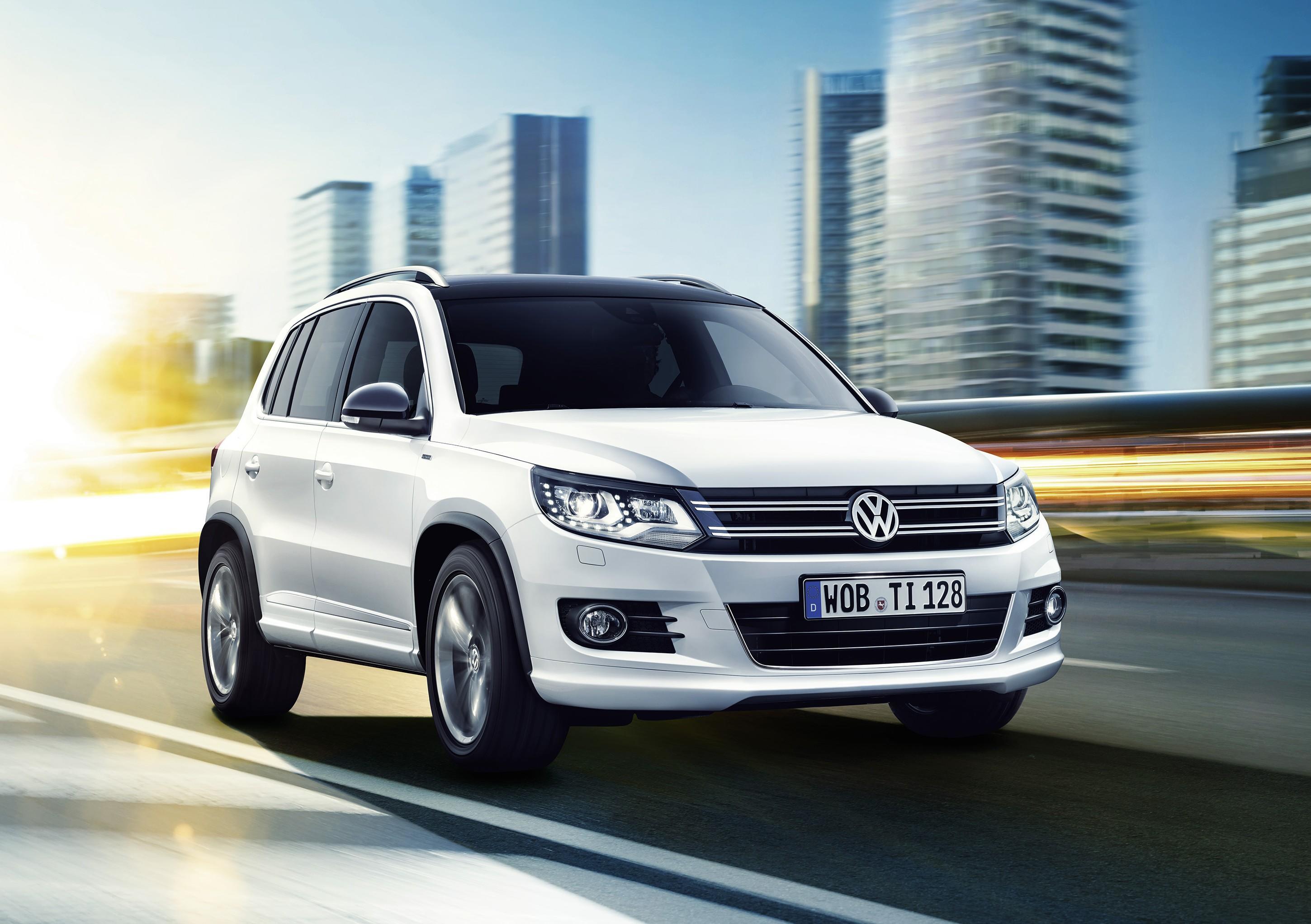 Сколько стоит volkswagen tiguan. Фольксваген Тигуан 2014. Фольксваген Тигуан 2015. Фольксваген Тигуан 2014г. Машина wolchvagen Тигуан.